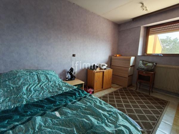 Maison mitoyenne à rénover avec fort potentiel