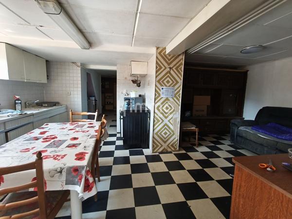 Maison mitoyenne à rénover avec fort potentiel