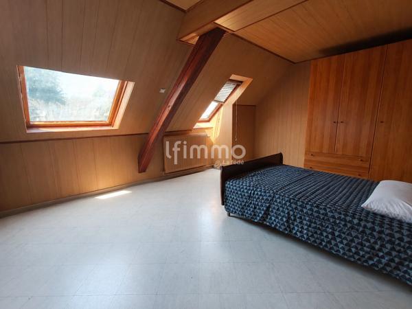 Maison mitoyenne à rénover avec fort potentiel