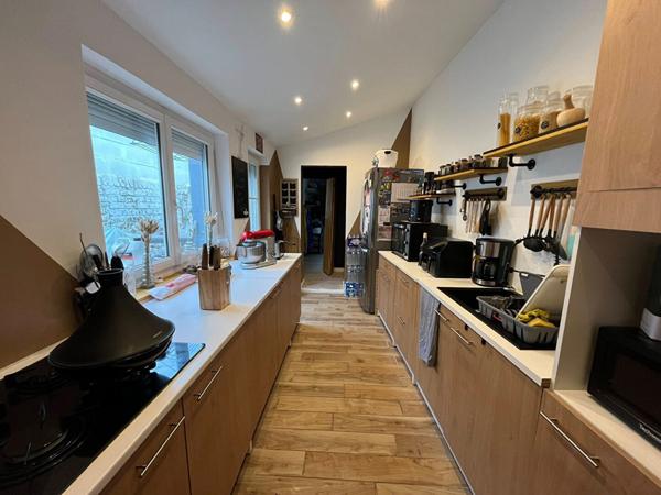 Maison  à Calais de 100 m2, en semi plain-pied, 3 chambres, espace bureau, jardin expo sud