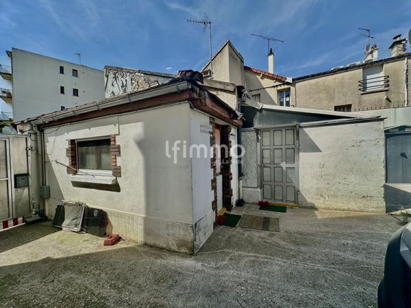 Romainville- Entrepôt 160m2 +2 logements 55m2- Parcelle 380m2