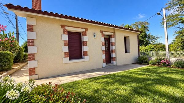 Maison rénovée avec garage et jardin en centre-ville
