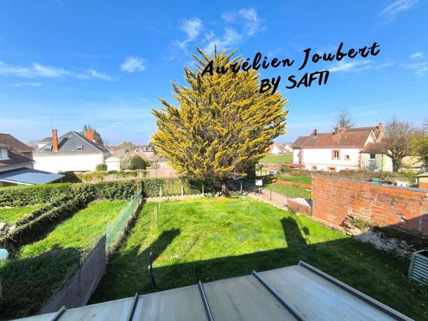 Maison de ville 80 m² avec garage 56 m² et jardin