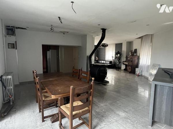 A vendre, Maison type 1930 individuelle avec jardin - parking.