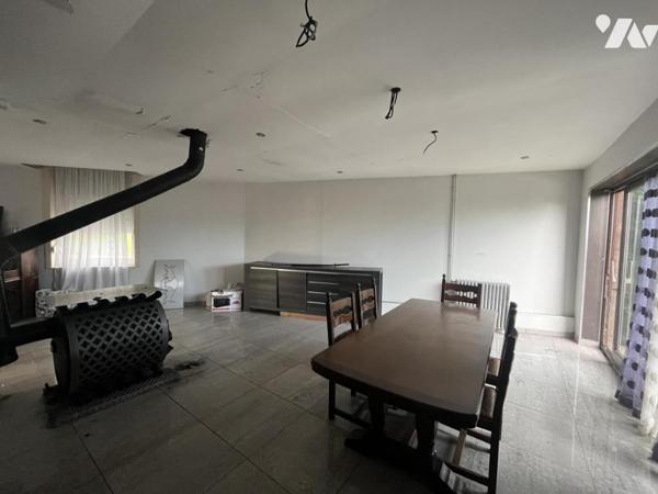 A vendre, Maison type 1930 individuelle avec jardin - parking.