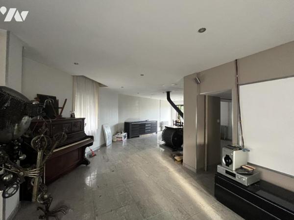 A vendre, Maison type 1930 individuelle avec jardin - parking.