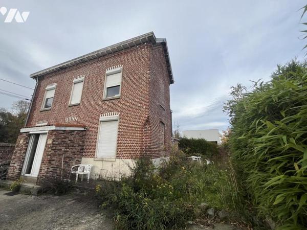 A vendre, Maison type 1930 individuelle avec jardin - parking.