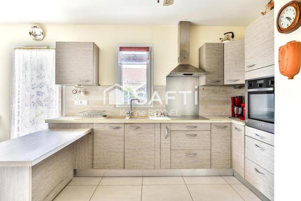 T3 en rez-de-jardin de 75 m², terrasse et jardin privatifs.