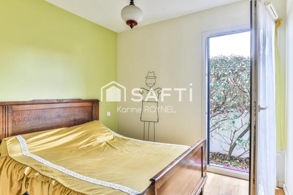 T3 en rez-de-jardin de 75 m², terrasse et jardin privatifs.