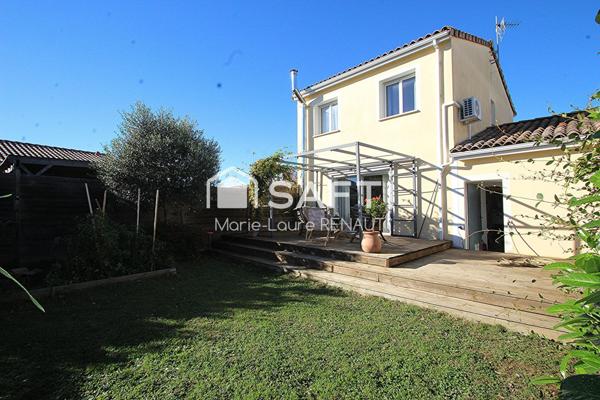 Maison avec jardin, grande terrasse, garage, carport, 3 chambres.