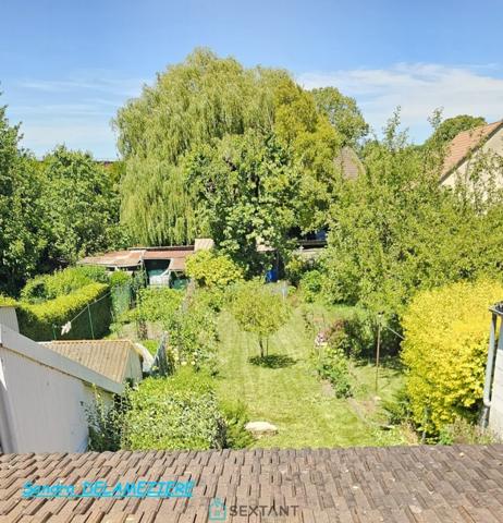 Maison familiale avec garage et jardin