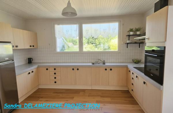 Maison familiale avec garage et jardin