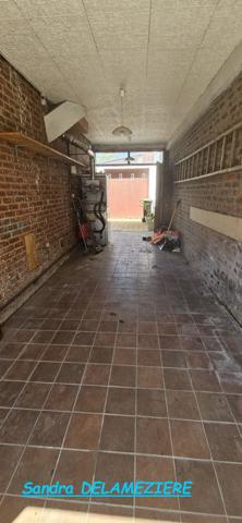 Maison familiale avec garage et jardin