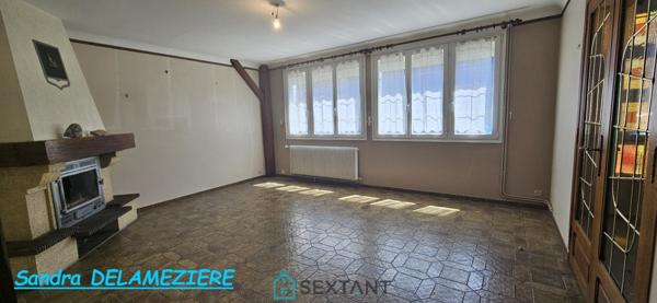 Maison familiale avec garage et jardin