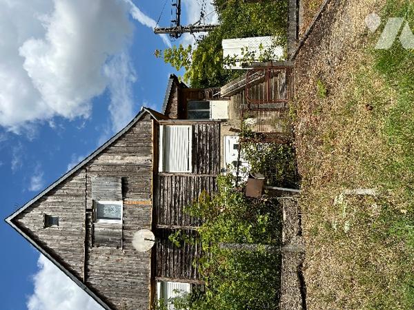 Maison surélevée à rénover