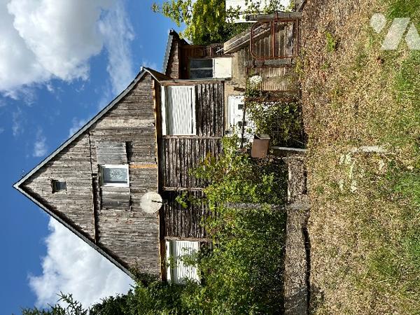 Maison surélevée à rénover