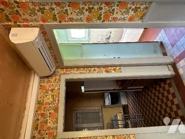 Maison surélevée à rénover