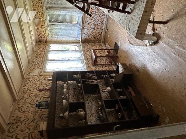 Maison surélevée à rénover