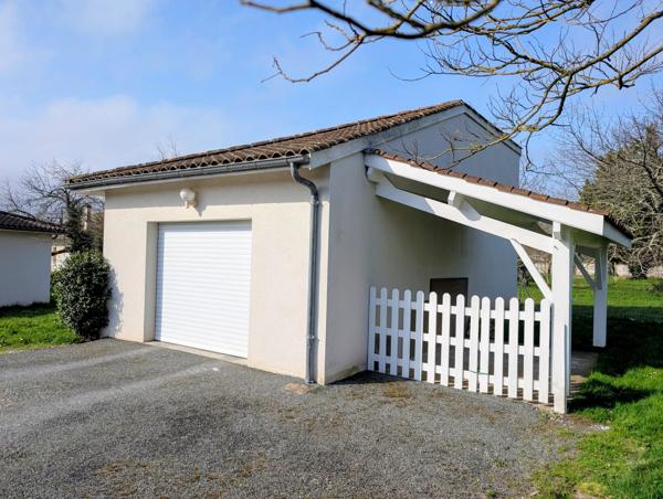 Joli pavillon avec garages et jardin proche du centre ville de Villeneuve Sur Lot