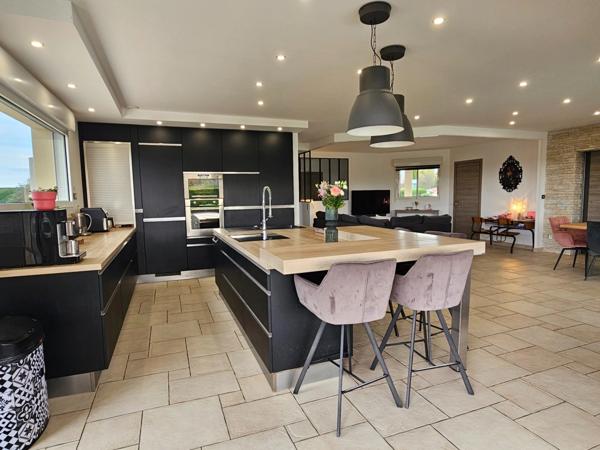 Maison contemporaine de 202 m² – Garage exceptionnel de 130 m² a vendre