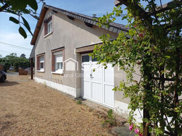 Ensemble 2 habitations de plain-pied communicantes avec garage et terrain