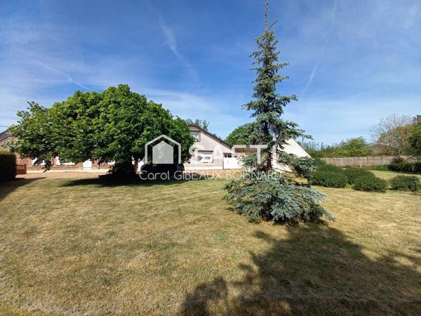 Ensemble 2 habitations de plain-pied communicantes avec garage et terrain