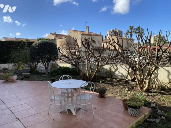 Villa T4 avec jardin et garage.