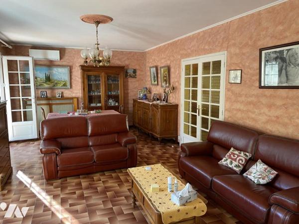 Villa T4 avec jardin et garage.