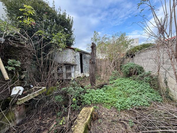 Maison à rénover quartier Sainte-Anne avec garage double et jardin