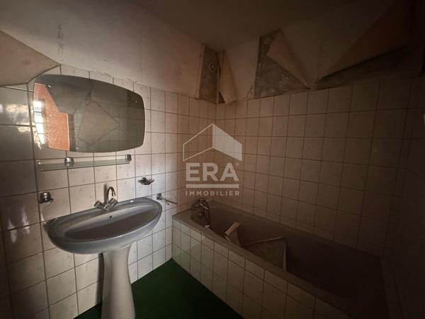 Immeuble à Bourg 4 pièce(s) 124 m2 habitable 