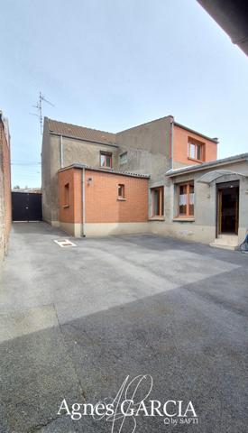 Maison familiale avec hangar et grand jardin