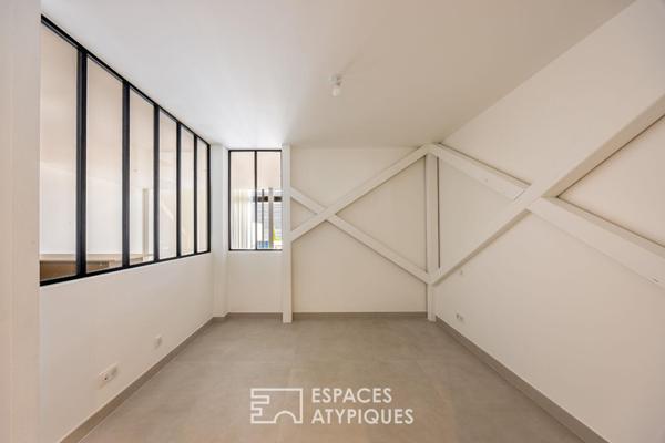 Loft contemporain en duplex et sa terrasse dans une ancienne friche industrielle