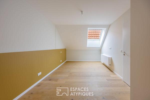 Loft contemporain en duplex et sa terrasse dans une ancienne friche industrielle