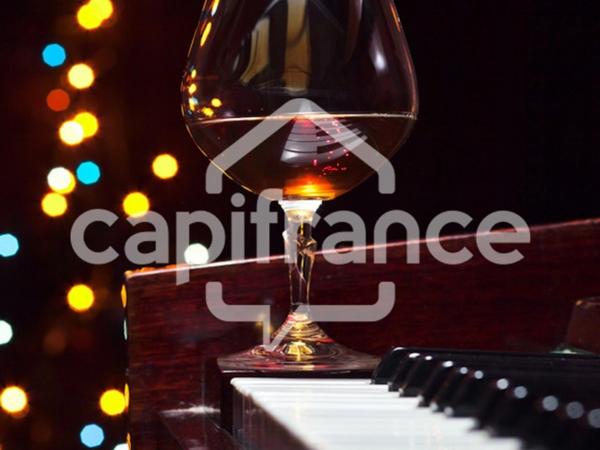 Fonds et murs (ou fonds uniquement) d'un bar à vins-cave à vins-tapas-épicerie fine à vendre en arrière pays héraultais