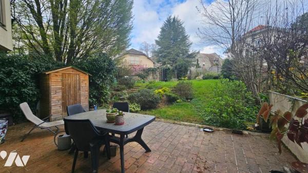 Appartement T3 avec spacieux jardin, garage et cave 