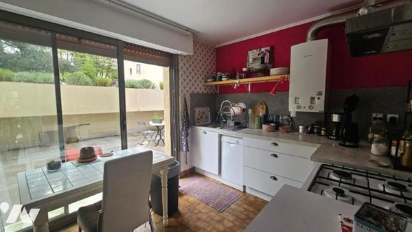 Appartement T3 avec spacieux jardin, garage et cave 
