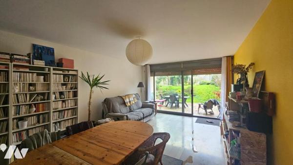 Appartement T3 avec spacieux jardin, garage et cave 