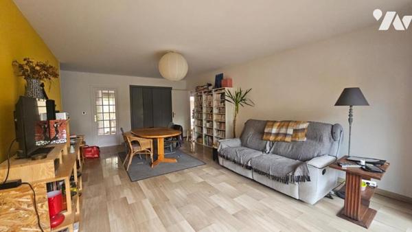 Appartement T3 avec spacieux jardin, garage et cave 