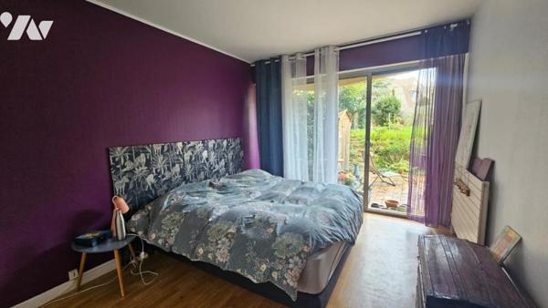 Appartement T3 avec spacieux jardin, garage et cave 