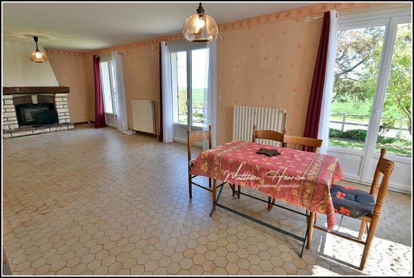 Maison familiale 4 chambres avec vie de plain-pied, sous-sol total et jardin de 1 380 m²