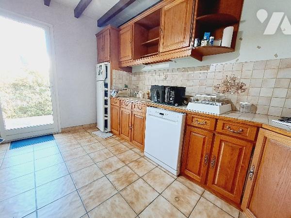 SAUZET, maison de 113m² habitable avec jardin clos de 1350m² et garage.