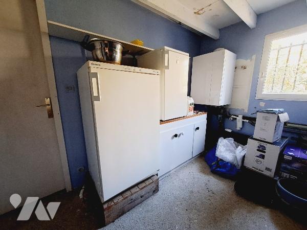 SAUZET, maison de 113m² habitable avec jardin clos de 1350m² et garage.