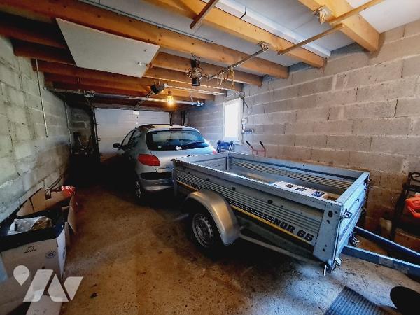 SAUZET, maison de 113m² habitable avec jardin clos de 1350m² et garage.