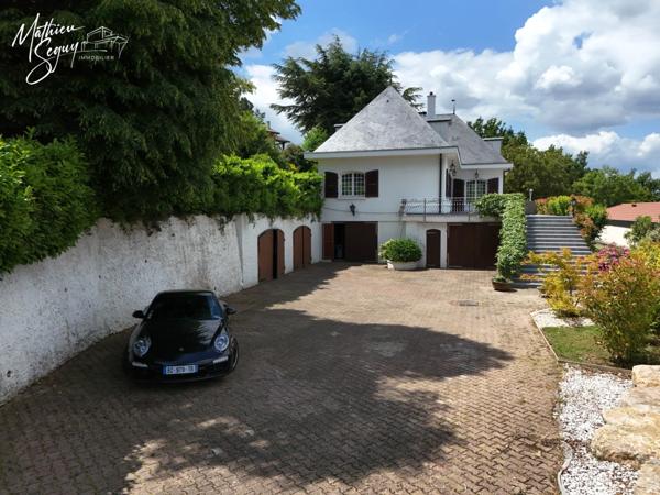 PROPRIETE à MARENNES (69) à proximité de LYON, avec une position et vue dominante sur la Plaine et sous sol XXL