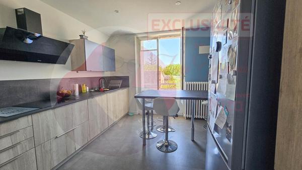 Maison de 155 m² avec 4 chambres, garage et jardin en centre ville