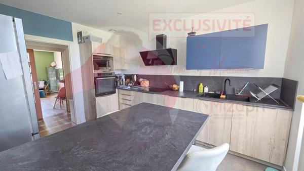 Maison de 155 m² avec 4 chambres, garage et jardin en centre ville