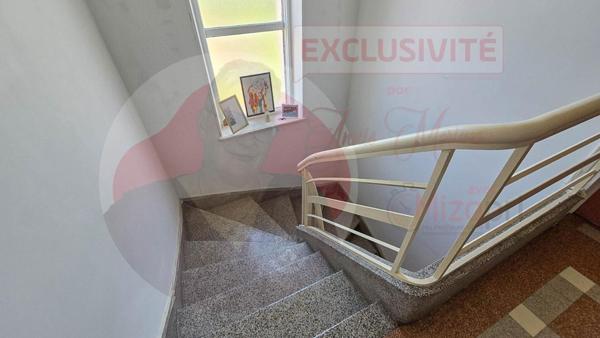 Maison de 155 m² avec 4 chambres, garage et jardin en centre ville