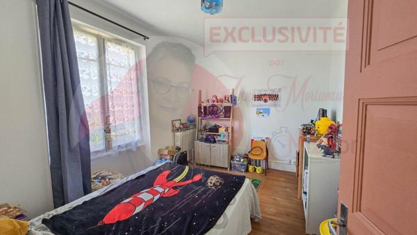 Maison de 155 m² avec 4 chambres, garage et jardin en centre ville