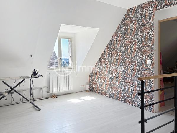 MAISON FAMILIALE SUR SOUS SOL AVEC VIE DE PLAIN PIED