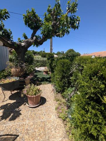 Villa plain pied avec garage et jardin dans le village au calme